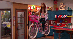 Ariana Grande Riding Cycle GIF