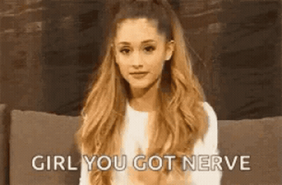 Ariana Grande Sitting On Couch Girl You Got Nerve GIF