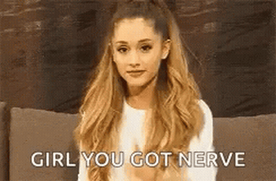 Ariana Grande Sitting On Couch GIF