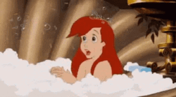 Ariel Blows Bubbles While Having Bubble Bath GIF