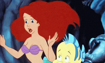 Ariel Standing Next To Flounder GIF