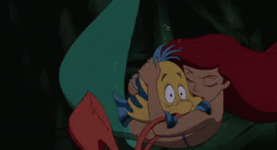 Ariel The Little Mermaid Holding Yellow Fish GIF