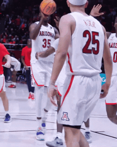 Arizona Basketball Players Number 35 And 25 Are Playing A Game GIF