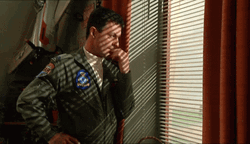 Army Aviator Looking Out The Window GIF