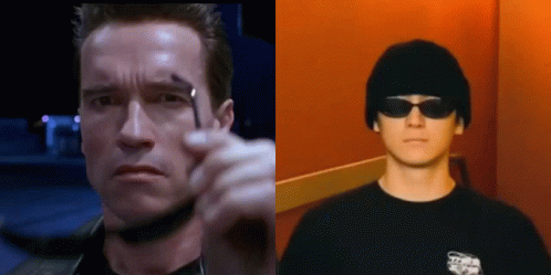Arnold Schwarzenegger And A Young Man Wearing Sunglasses And A Beanie . GIF