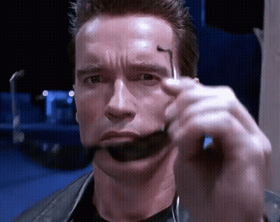 Arnold Schwarzenegger Holding Glasses GIF