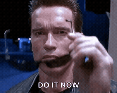Arnold Schwarzenegger Holding Sunglasses Saying Do It Now GIF