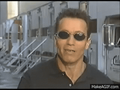 Arnold Schwarzenegger In Sunglasses And Black Shirt GIF