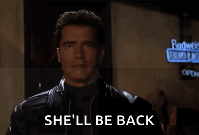 Arnold Schwarzenegger In Sunglasses And Leather Jacket Saying She'll Be Back GIF
