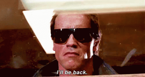 Arnold Schwarzenegger Is Wearing Sunglasses And Saying I 'Ll Be Back . GIF