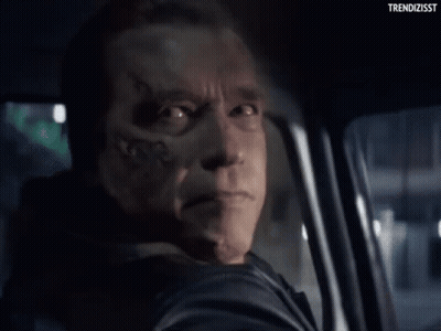 Arnold Schwarzenegger Making Funny Face In Car GIF