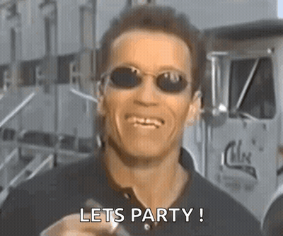 Arnold Schwarzenegger Smiling In Sunglasses Saying Lets Party GIF