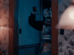 Art The Clown In Bloody  Apron From Kitchen GIF