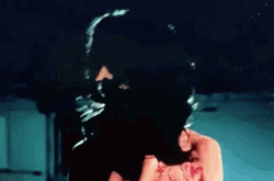 Art The Clown Wearing Lady's Skin And Hair GIF
