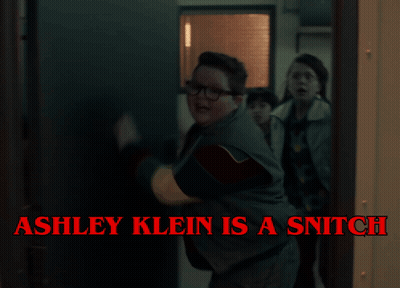 Ashley Klein Is A Snitch Is Written On A Poster GIF