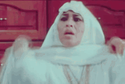 Asian Stereotype Flex Her Jewelry GIF