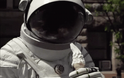 Astronaut Eating Ice Cream Cone GIF