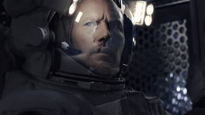 Astronaut Helmet Reflecting Moon GIF