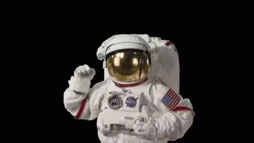 Astronaut In Space Suit Giving Thumbs Up GIF