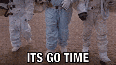 Astronauts Walking On Brick Sidewalk Saying Its Go Time GIF