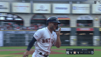 astros player paxton talking on the phone during a game