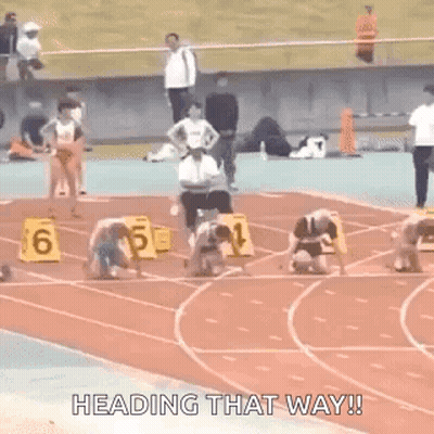 Athletes Getting Ready To Run On Track GIF