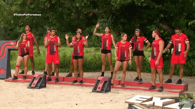 Athletes in Red Uniforms With Matt