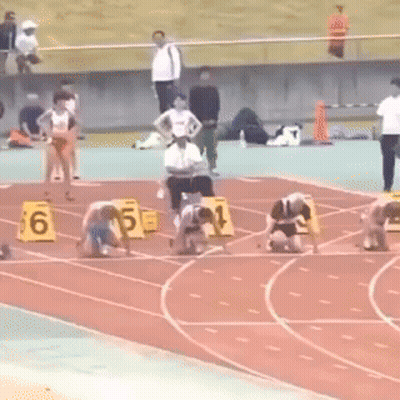 Athletes Ready To Run On Track With Yellow Blocks 6 5 1 GIF