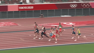 Athletes Running On Track With Tokyo 2020 Banner GIF