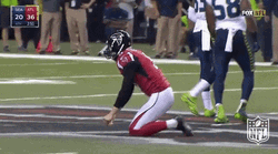 Atlanta Falcons Drake London Kneels On Field GIF