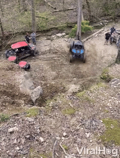 ATVs Driving Down Dirt Road In Woods Viralhog GIF