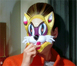 Audrey Hepburn Taking Off Mask GIF