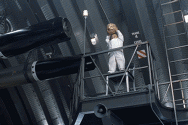 Austin Powers Mini Me Hitting Dr Evil GIF