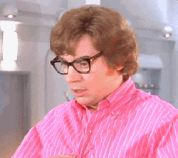 Austin Powers Mole Shows Off His Chest GIF