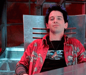 Austin Powers Scott Evil Sitting On Chair GIF