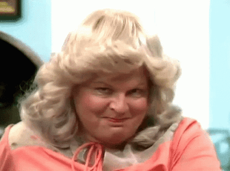 Awkward Blonde Bennie Hill Coy Laugh GIF