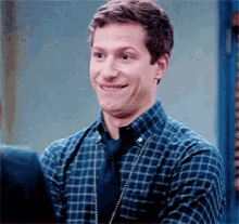 Awkward Lip Bite Andy Samberg GIF