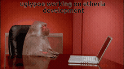 Baboon At Laptop With Uglypoe Working On Etheria Development GIF