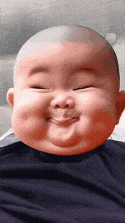 Baby Bald Head Making Funny Face GIF
