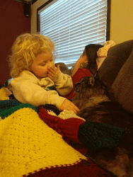 Baby Blowing Kisses To Her Cat GIF