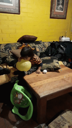 Baby Boy Bite Balloon Pop  GIF