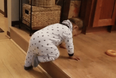 Baby Crawling On Wood Floor GIF