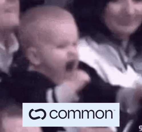 Baby Crying In Crowd With Logo GIF