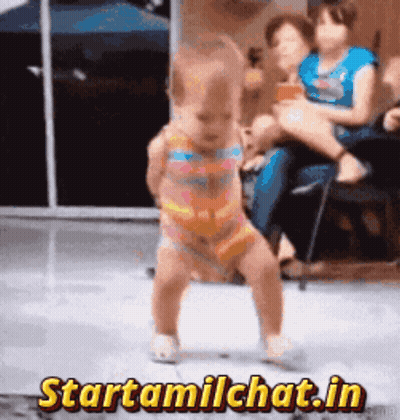 Baby Dancing In Front Of Starttamilchat Sign GIF
