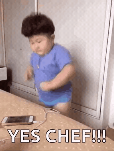Baby Dancing On Bed With Cell Phone Yes Chef GIF