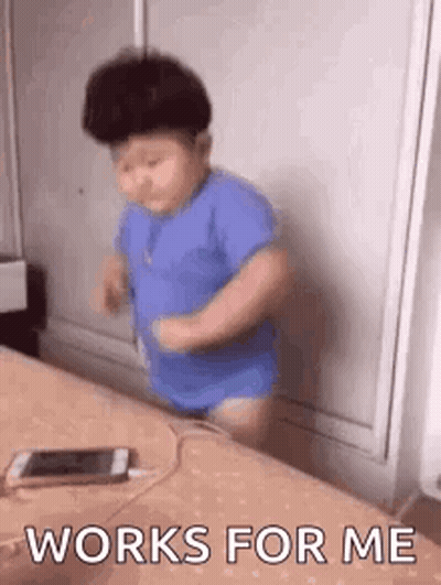 Baby Dancing With Cell Phone GIF