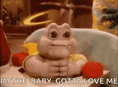 Baby Dinosaur Sitting In High Chair GIF