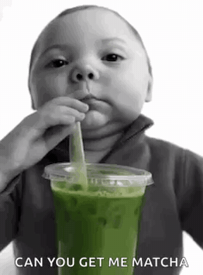 Baby Drinking Green Tea Through Straw GIF