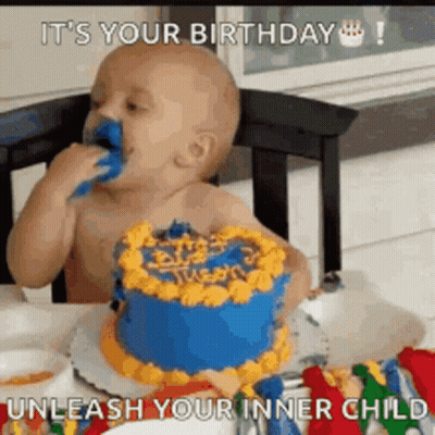 Baby Eating Birthday Cake With Blue Frosting GIF