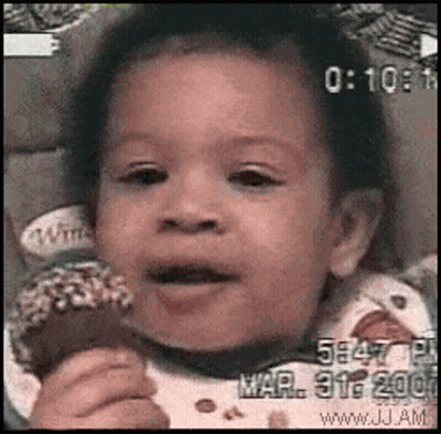 Baby Eating Donut Mar 31St 2001 GIF